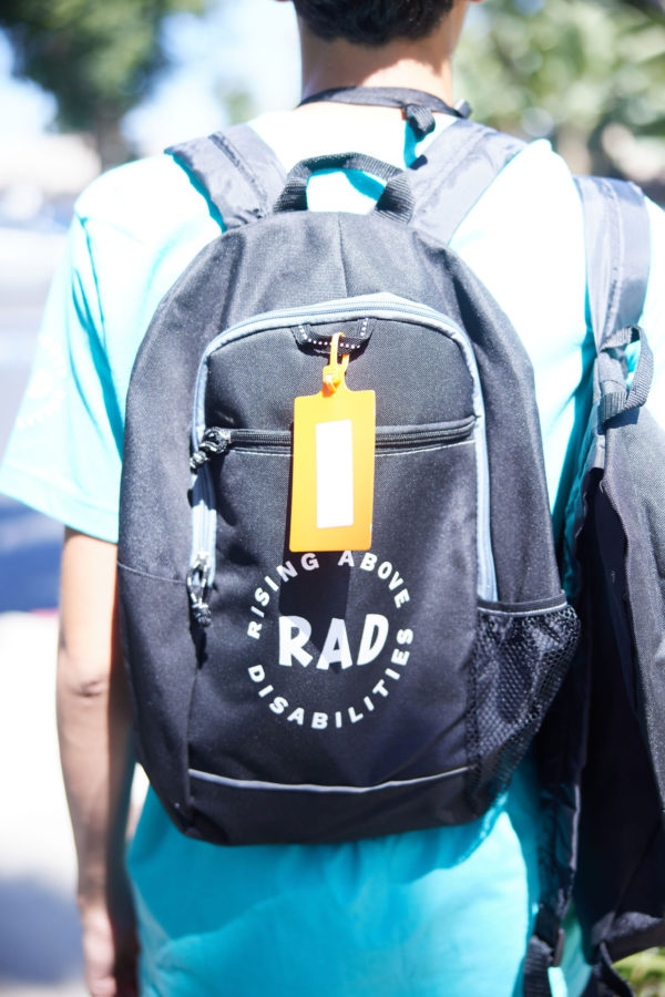Person wearing black RAD backpack