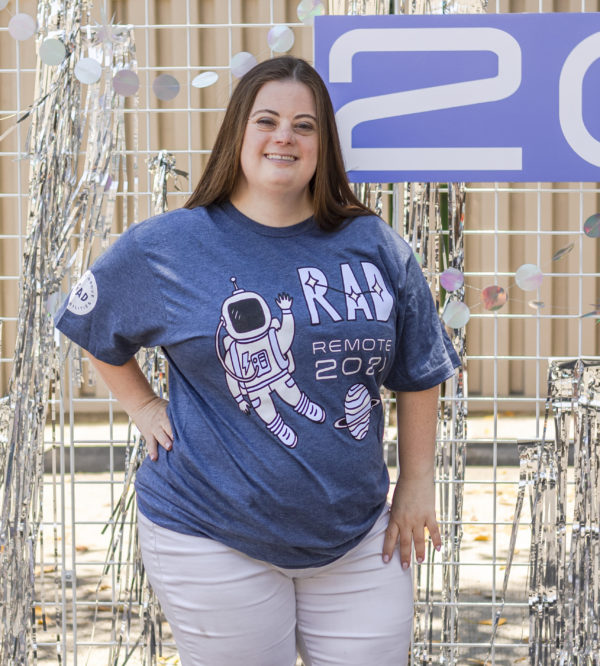 A woman wearing a RAD Remote 2021 t-shirt.