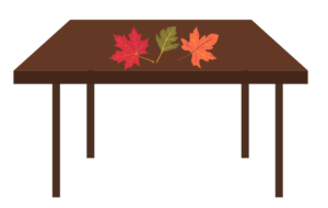 Illustration of fall leaves on a table